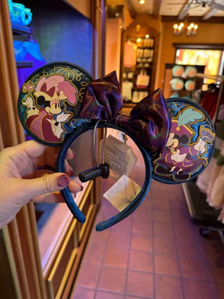 Disney Minnie Mouse headband with velvet bow and embroidered ears for Disney fans.