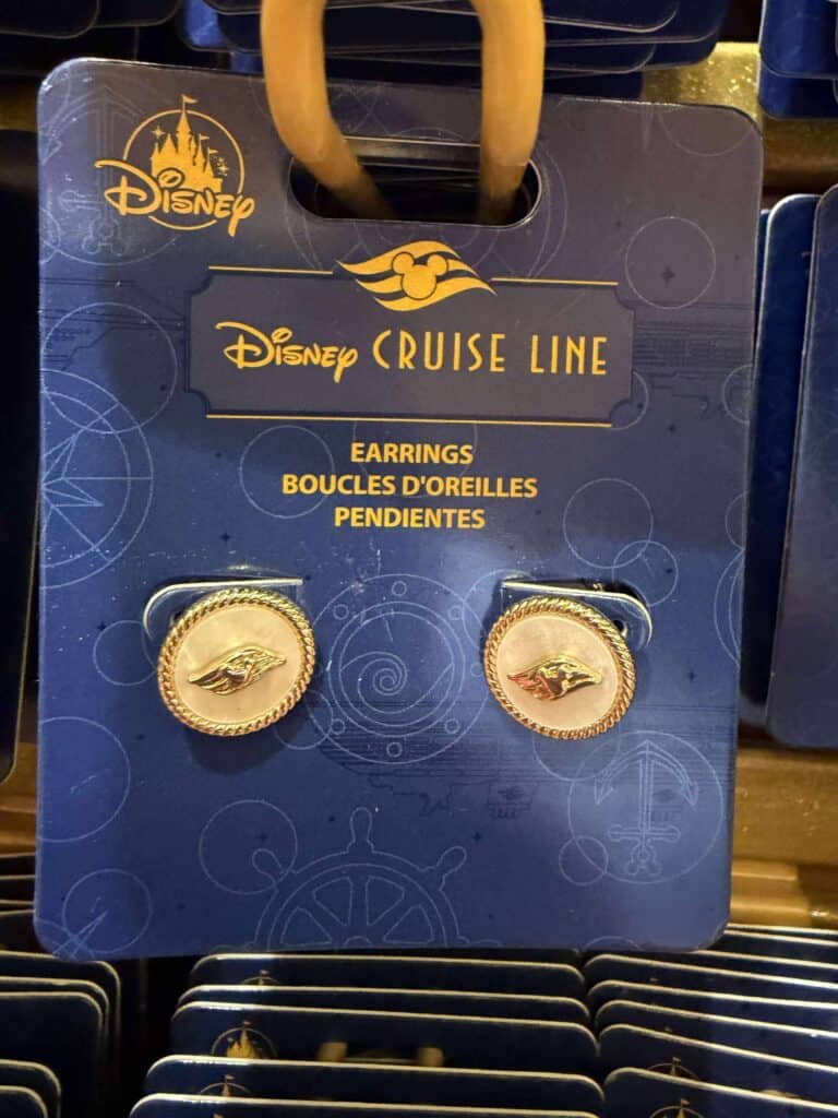 Disney cruise line earrings featuring a gold ship emblem, ideal Disney merchandise for accessories.