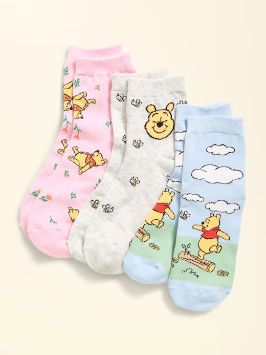 Disney Winnie the Pooh themed socks with playful designs and soft fabric for kids.