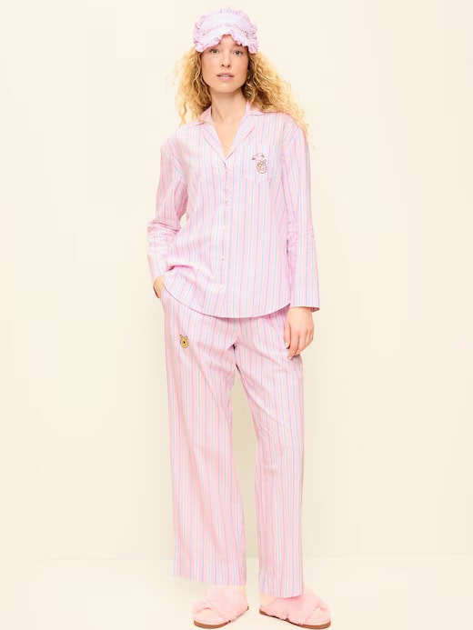Comfortable pink Disney themed pajama set with striped design and embroidered Minnie Mouse. Perfect for cozy nights.