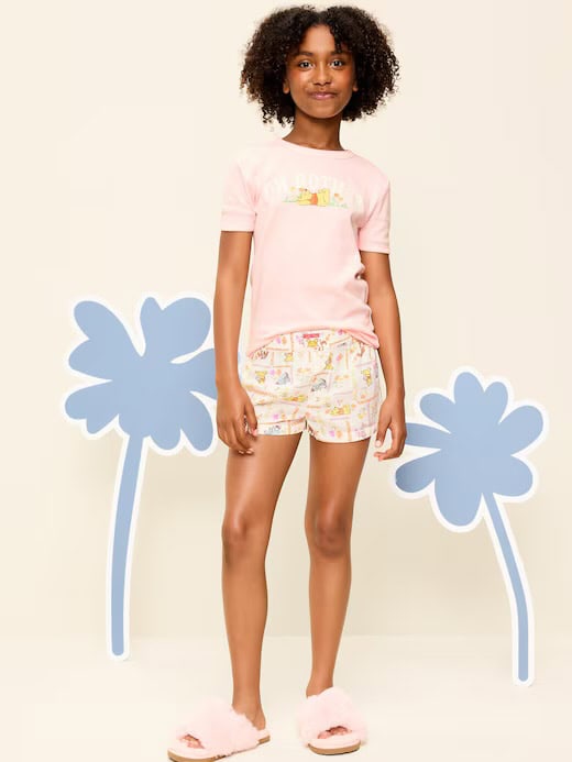 Cute Disney girl pajamas with pastel colors and fun patterns for comfortable sleep. Perfect for a cozy night in.