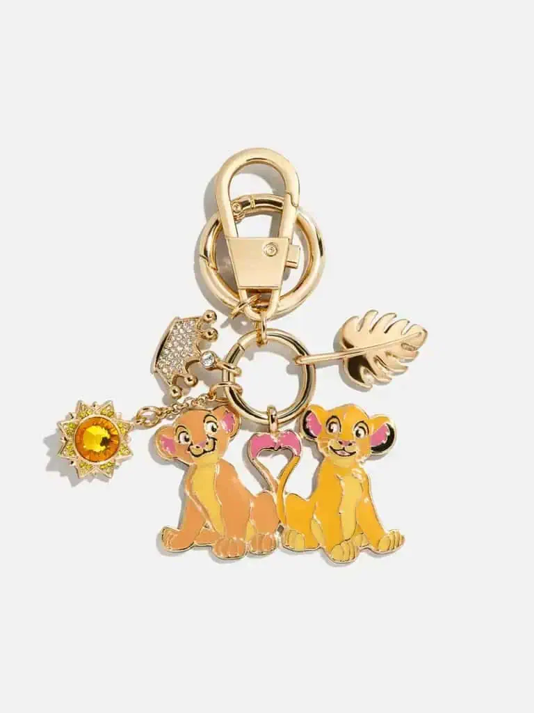 Cute Disney Lion King keychain with vibrant character charms and tropical leaf design, perfect for accessories.