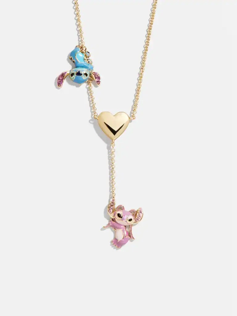 Colorful Disney character charms necklace with pink and blue enamel, gold accents, and heart pendant.