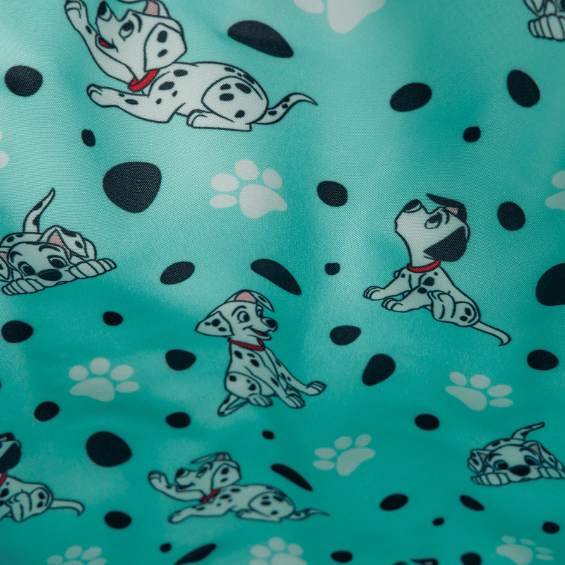 Adorable Dalmatian print featuring Disney dogs on teal background fabric. Perfect for kids' clothing, accessories, and DIY projects.