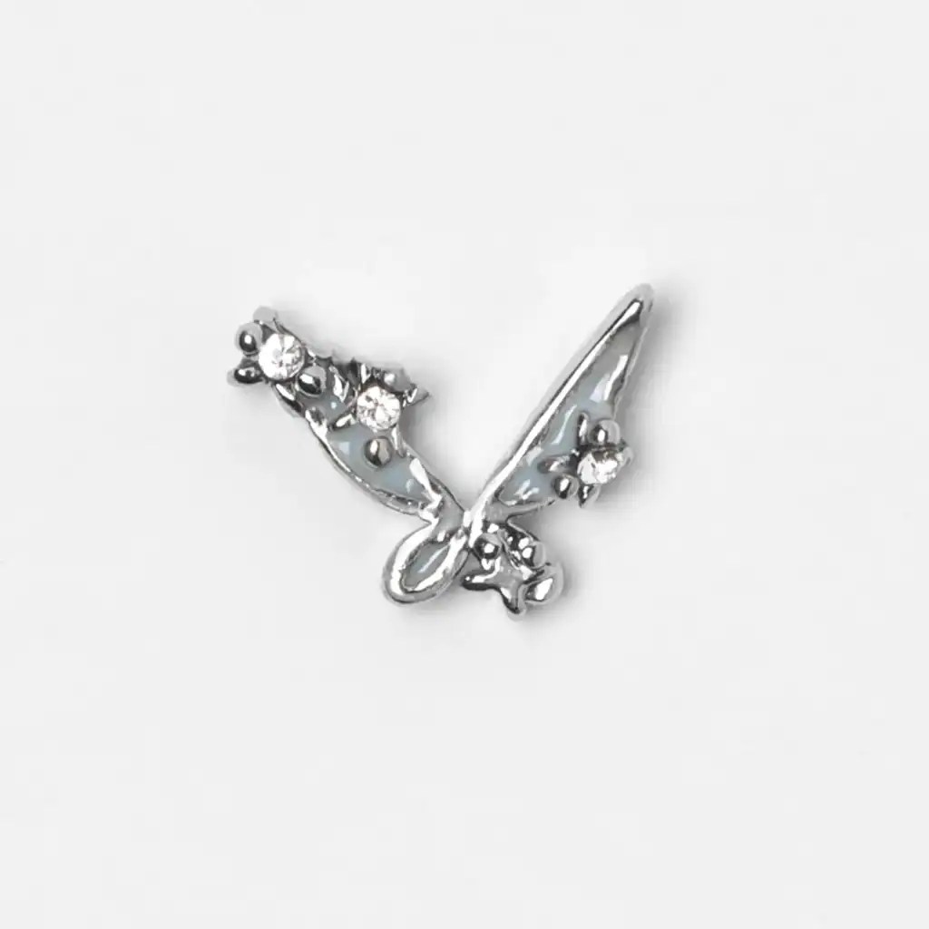 Elegant silver butterfly brooch with rhinestones, perfect Disney-inspired jewelry accessory for fashion lovers.