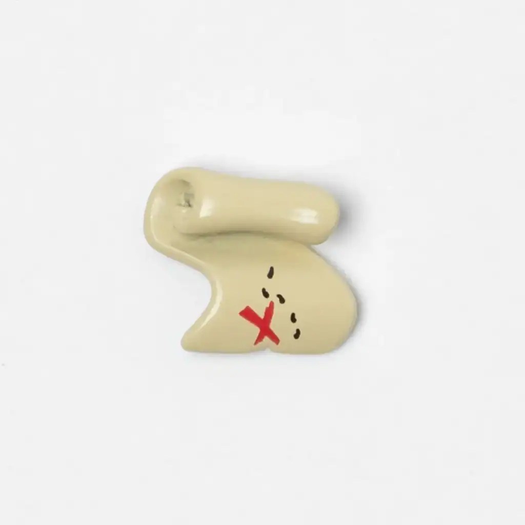 Miniature treasure map charm with red X and black dotted lines for Disney jewelry.