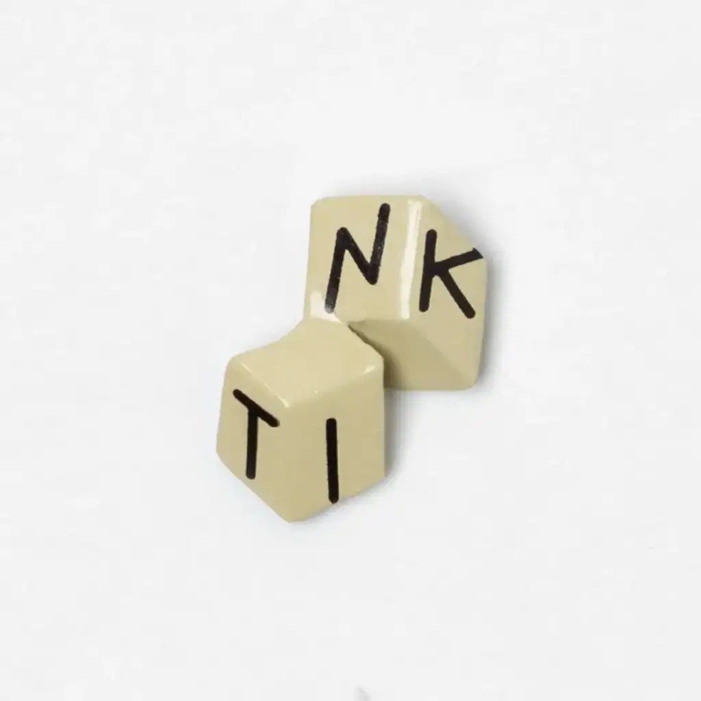 Colorful lettered toy blocks perfect for Disney-themed fashion displays and decor.