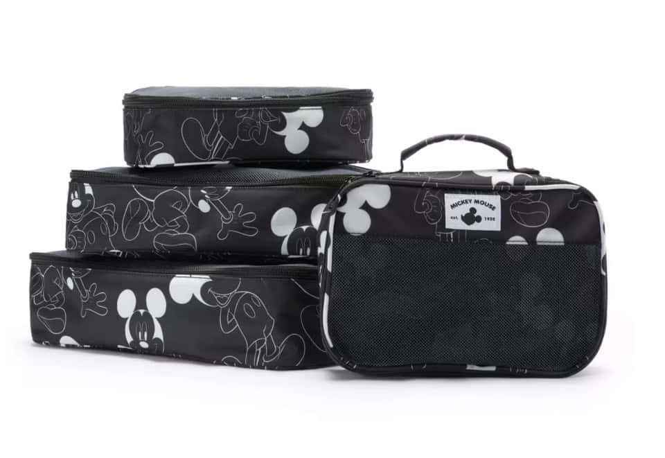 Stylish black and white Mickey Mouse travel accessories, perfect for Disney fans.