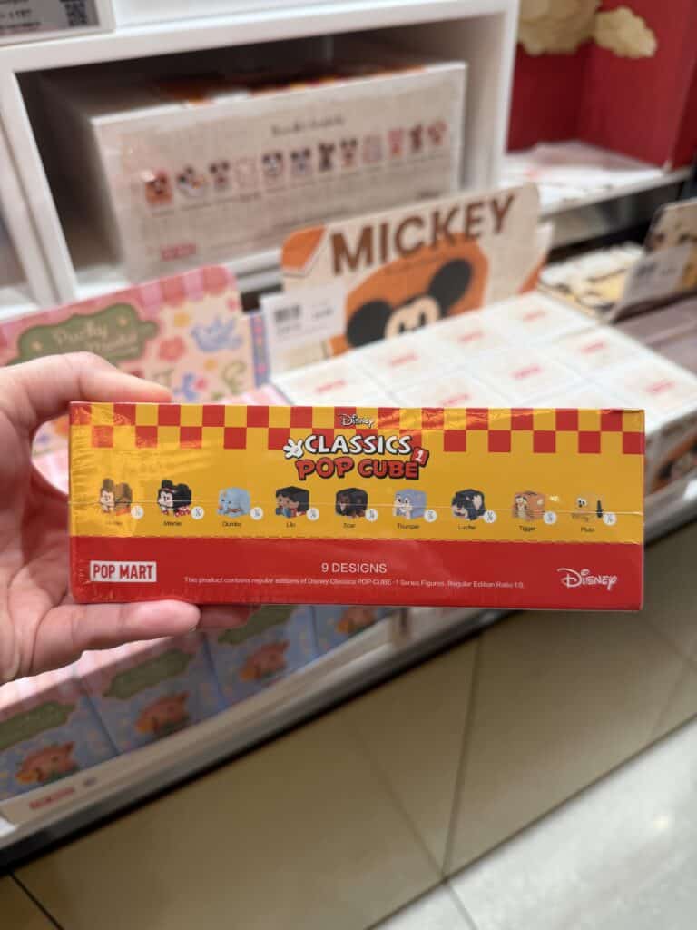 Alt text: Disney Classic Pop Cube metal puzzle featuring Mickey, Minnie, Dumbo, and other Disney characters.