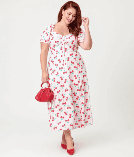 Elegant floral dress with cherry print for women.