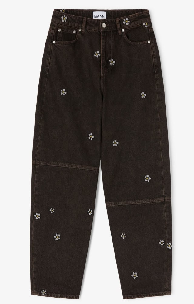 Daisy flower embellished black jeans perfect for casual Disney-inspired fashion looks.