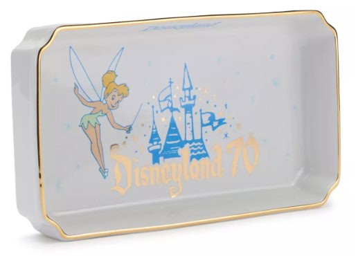 Disney castle plate with Tinker Bell design, celebrating Disneyland's 70th anniversary.