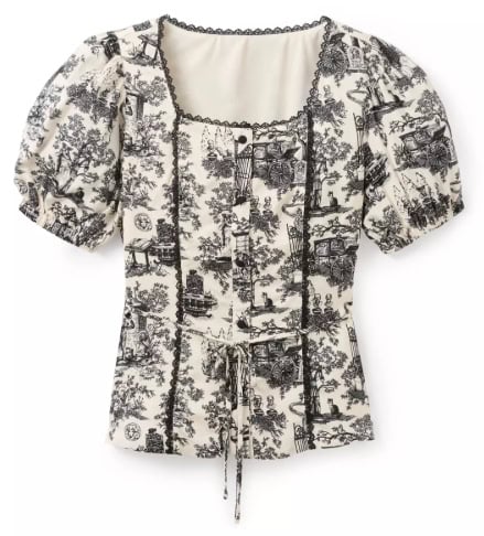 Elegant Disney-inspired puffer top featuring black and white scenic prints and puffed sleeves.