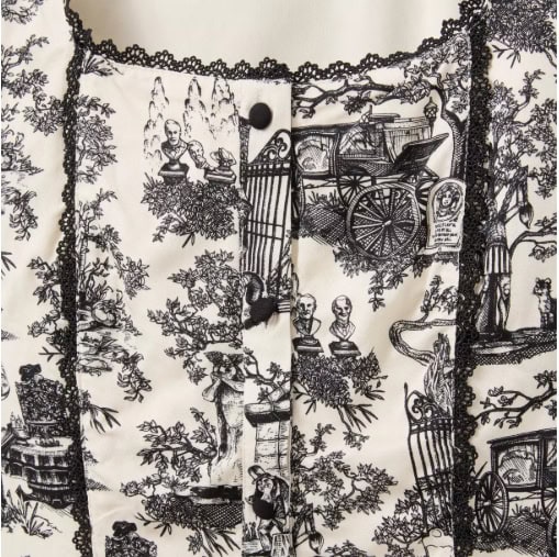 Whimsical Disney-inspired fashion fabric featuring enchanting forest and carriage motifs.