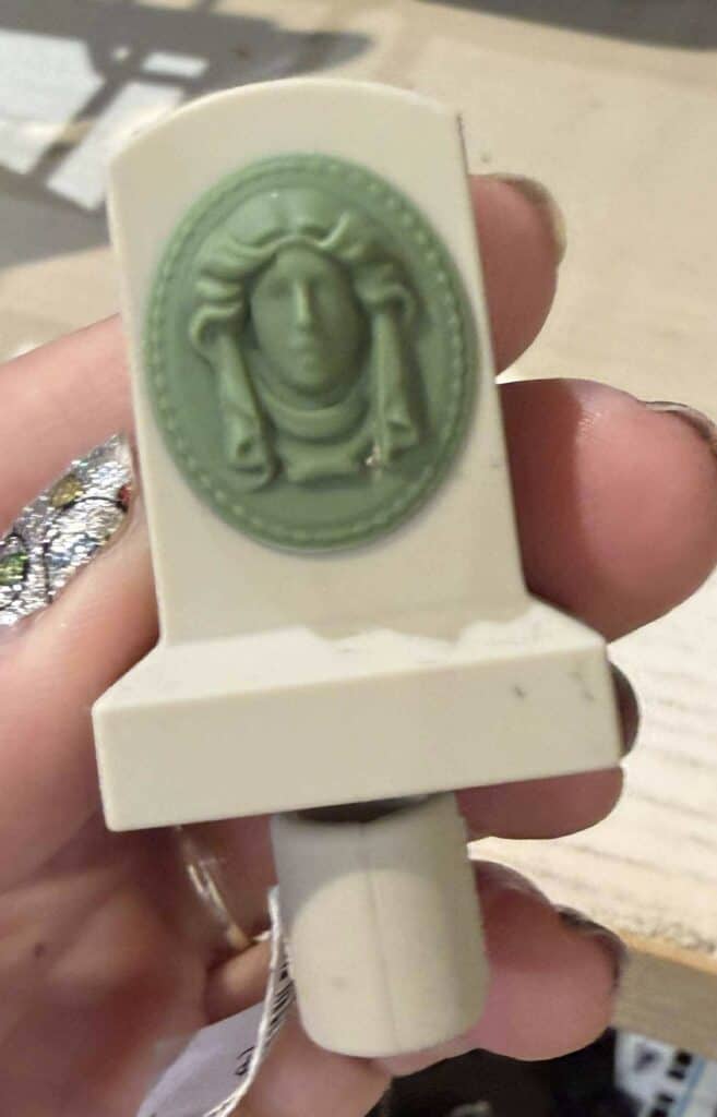 Detailed Starbucks logo wax seal stamp for collectors.