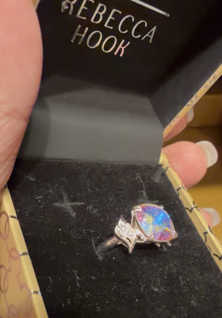 Disney jewelry ring with colorful iridescent gemstone, ideal for Disney fans and fashion accessories.