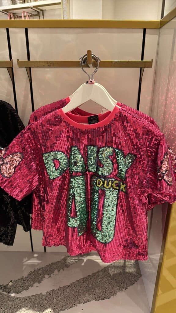 Sequin Disney Duck themed pink T-shirt, vibrant and stylish, ideal for children's Disney-inspired outfits.