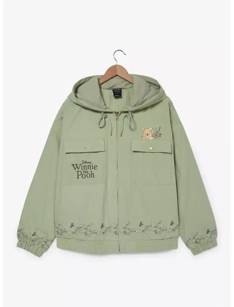 Light green Winnie the Pooh hoodie with embroidered character and floral details.