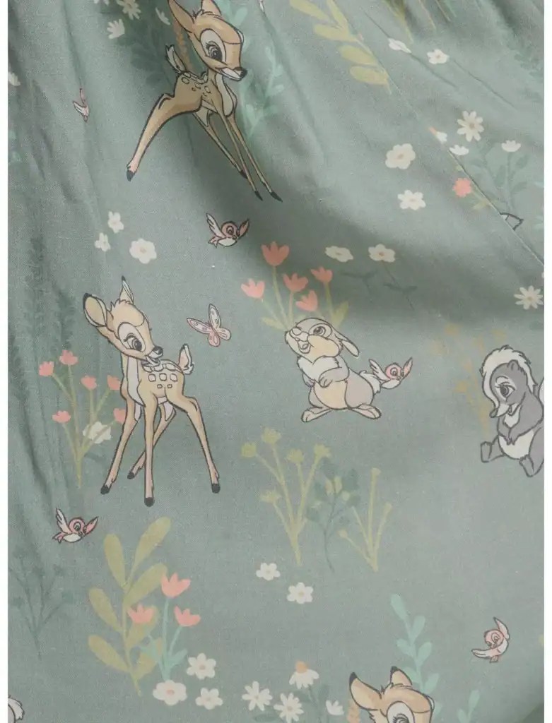 Disney animal print fabric with Bambi, Thumper, and friends in pastel colors.