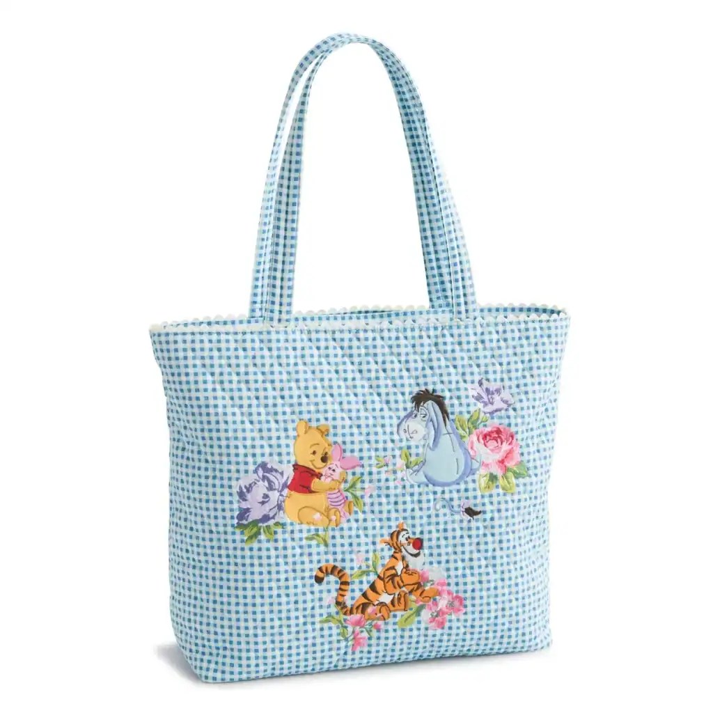 Disney Winnie the Pooh tote bag with Tigger, Eeyore, and floral details.