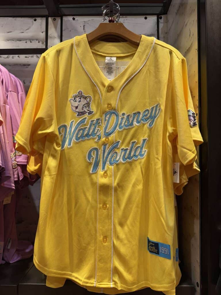 Walt Disney World baseball jersey in bright yellow with embroidered Mickey Mouse and "Walt Disney Wo.