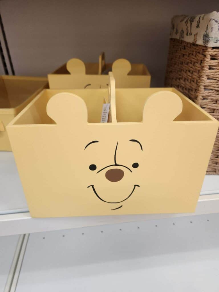 Winnie the Pooh themed storage bin for kids, featuring a cute face and bear ears design.