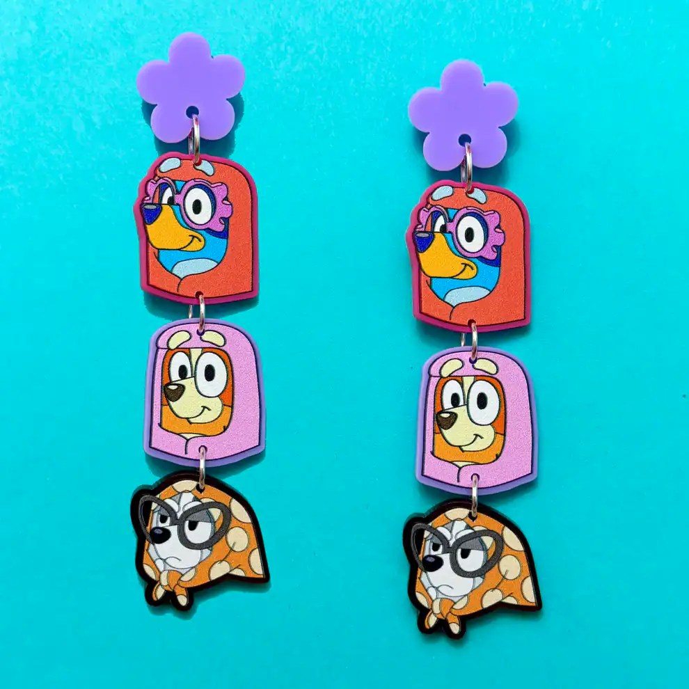 Disney character earrings with colorful charms and playful designs, ideal for Disney fans and access.