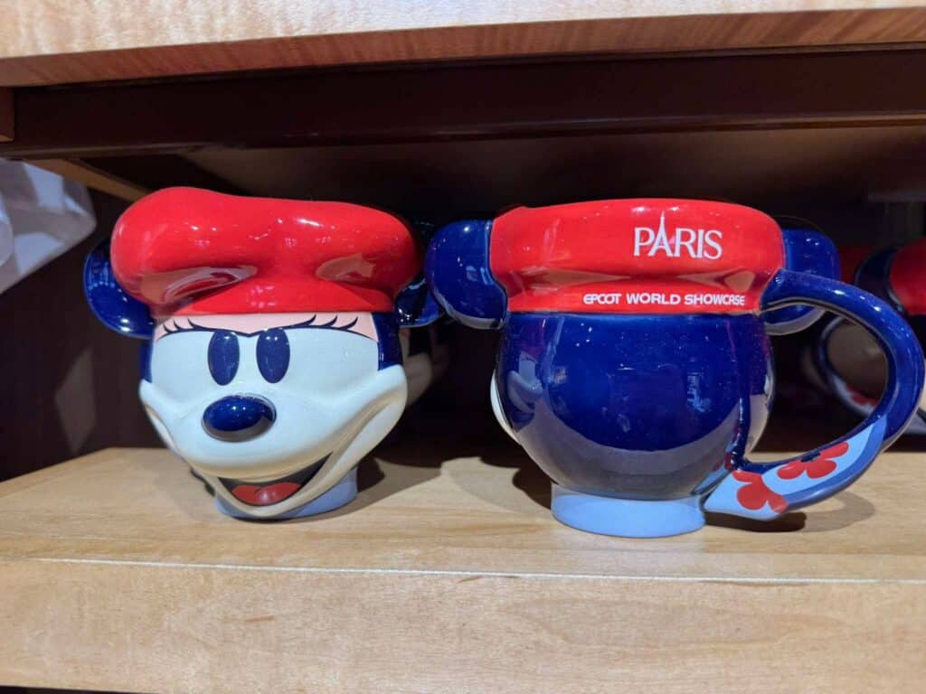 Minnie Mouse themed mug with "Paris" and "EPCOT World Showcase" text.
