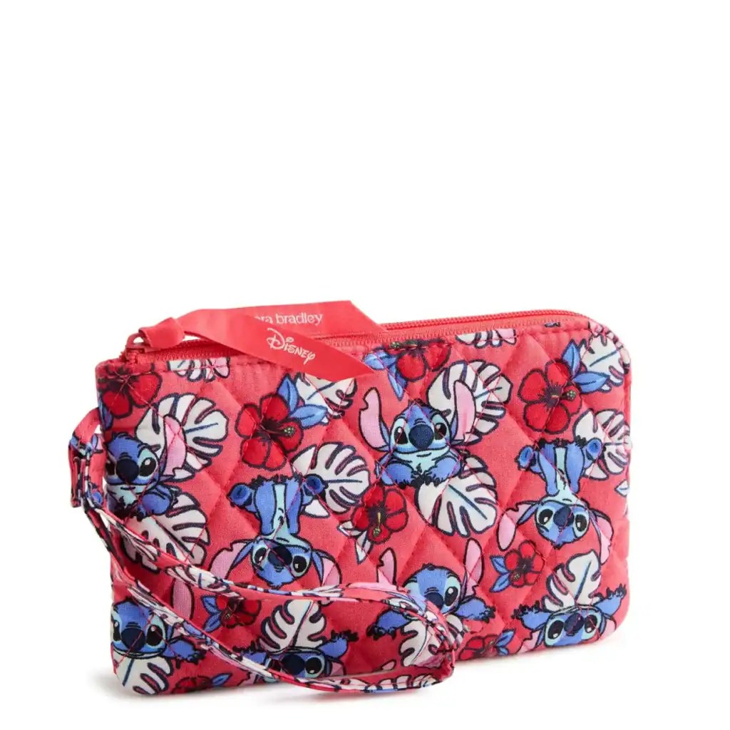 Disney Stitch floral print bag with pink background and strap.
