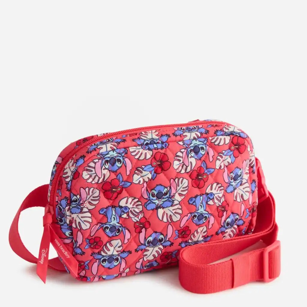Colorful Disney Stitch floral crossbody bag with red strap and zipper.