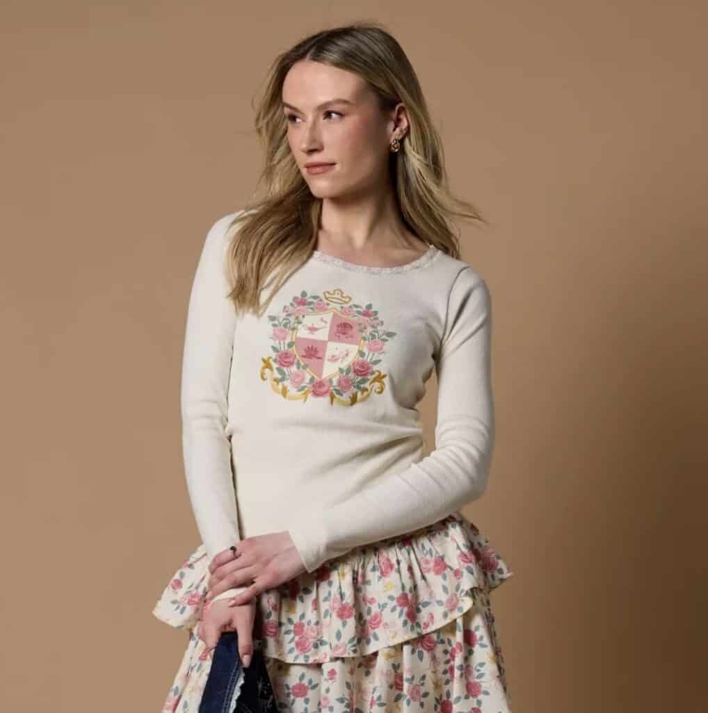 Elegant Disney princess-themed floral sweater and skirt for women.