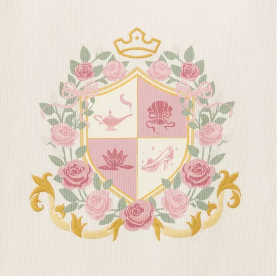 Elegant crest with pink roses, gold accents, and symbols of a lamp, flower, and shoe.