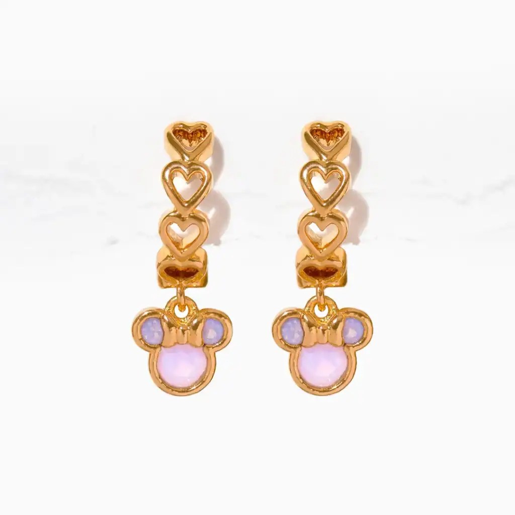 Gold heart and mouse-shaped dangling earrings with pink accents.