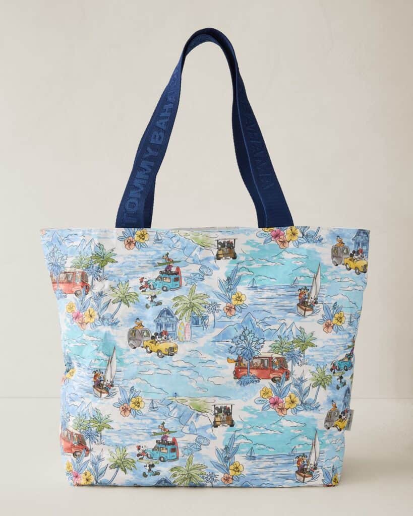Colorful Disney-themed tote bag with ocean and boat print, perfect for summer outings.