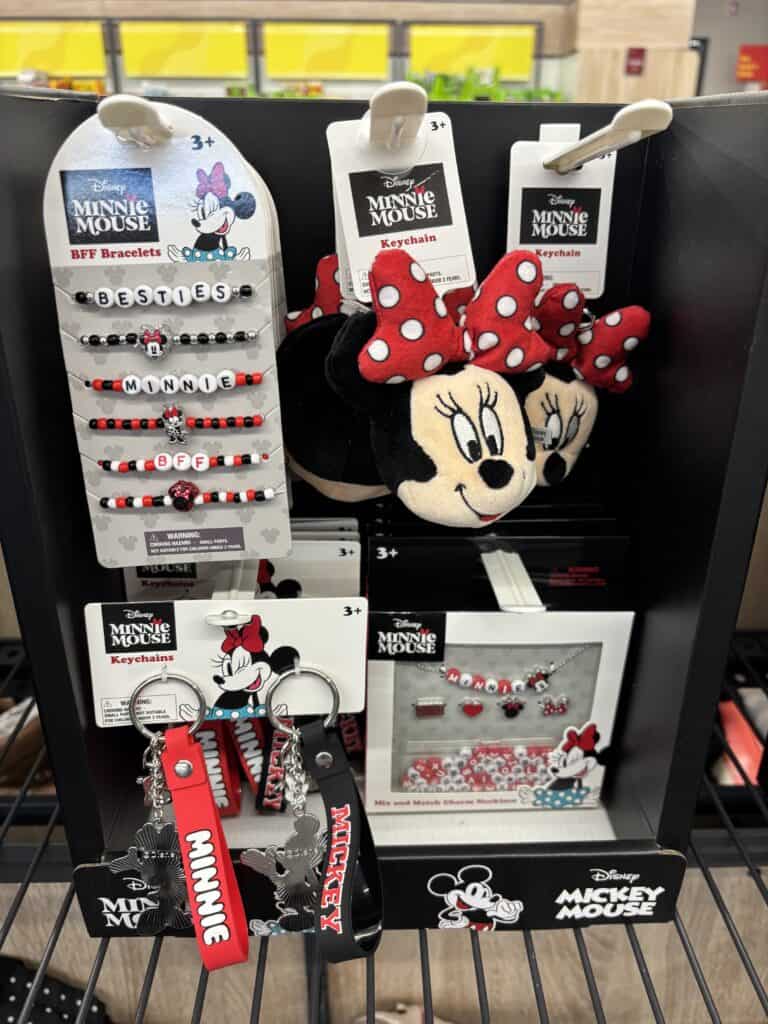 Themed jewelry and accessories for children, featuring bracelets, keychains, and plush items.