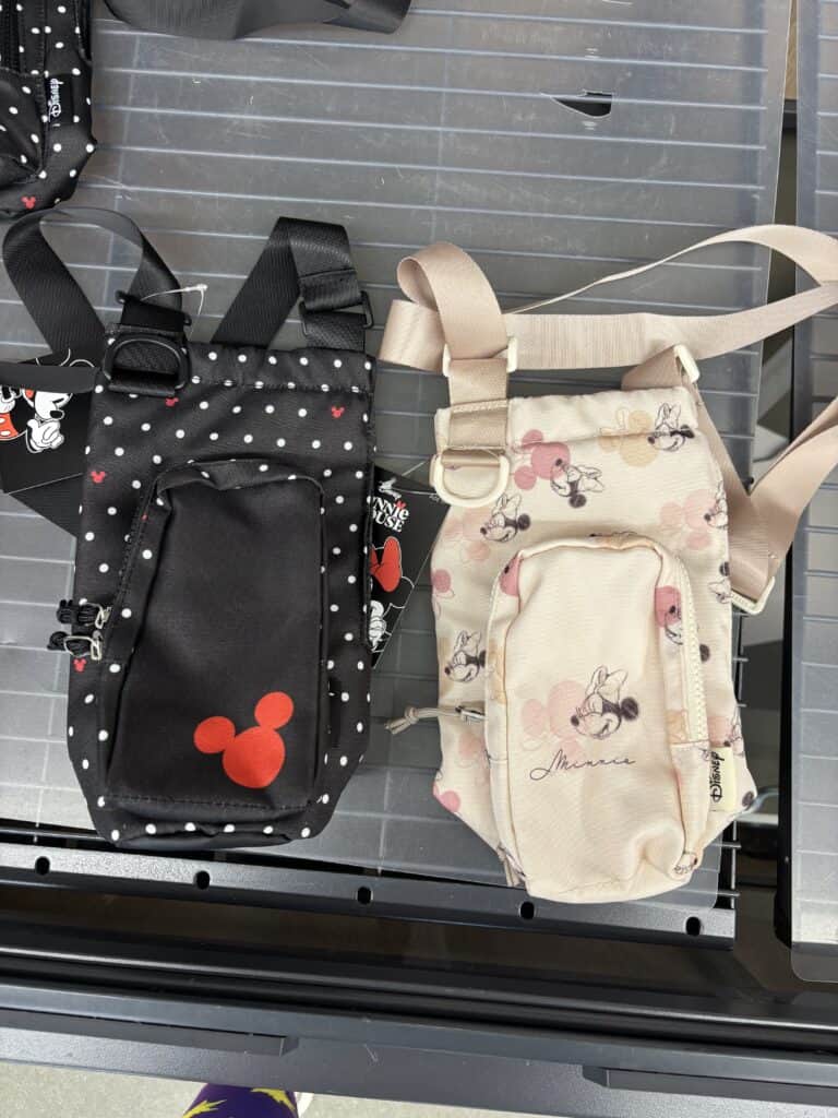 Themed backpacks with Mickey Mouse designs and adjustable straps.
