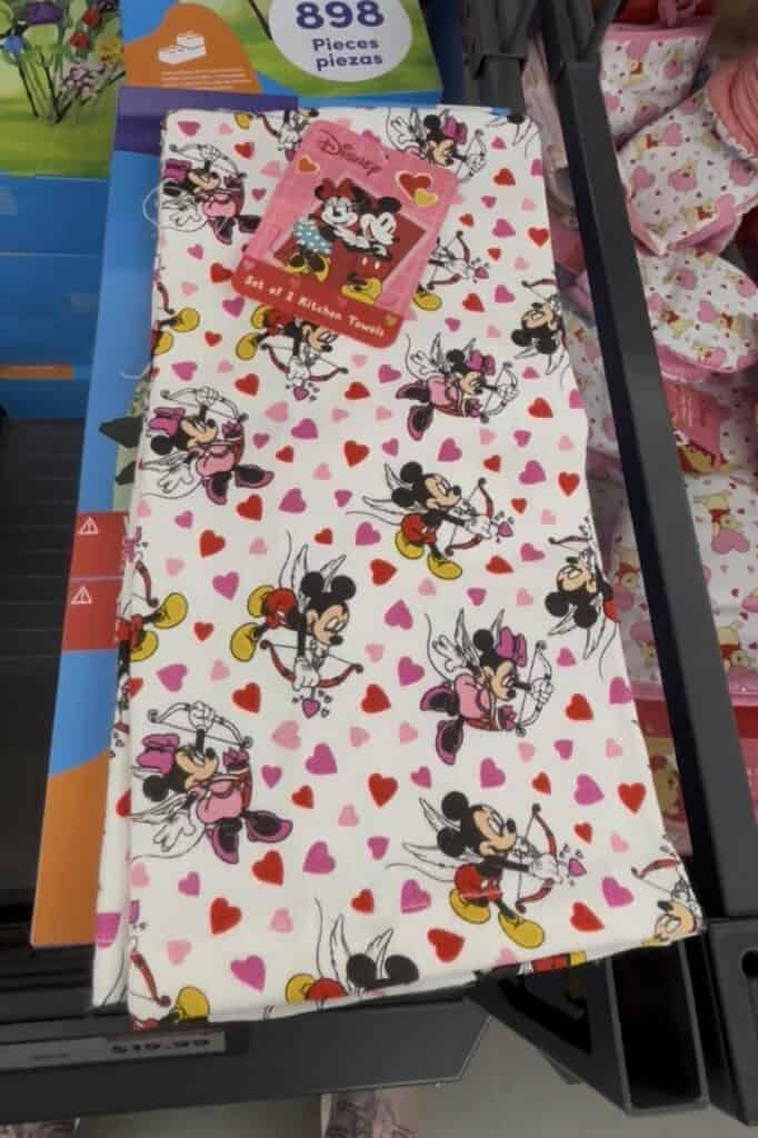 Colorful Minnie Mouse fabric gift wrap with hearts, perfect for Disney-themed presents.