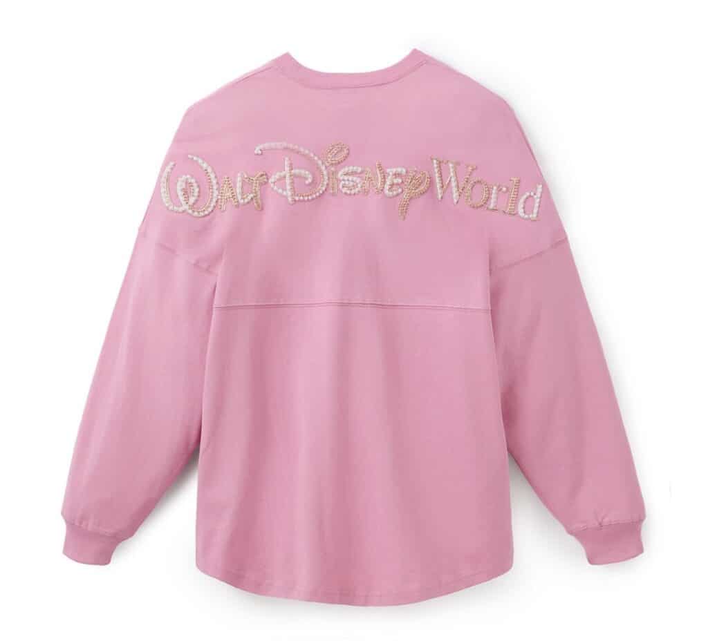 Pink Disney World sweatshirt with glitter logo, casual and stylish.