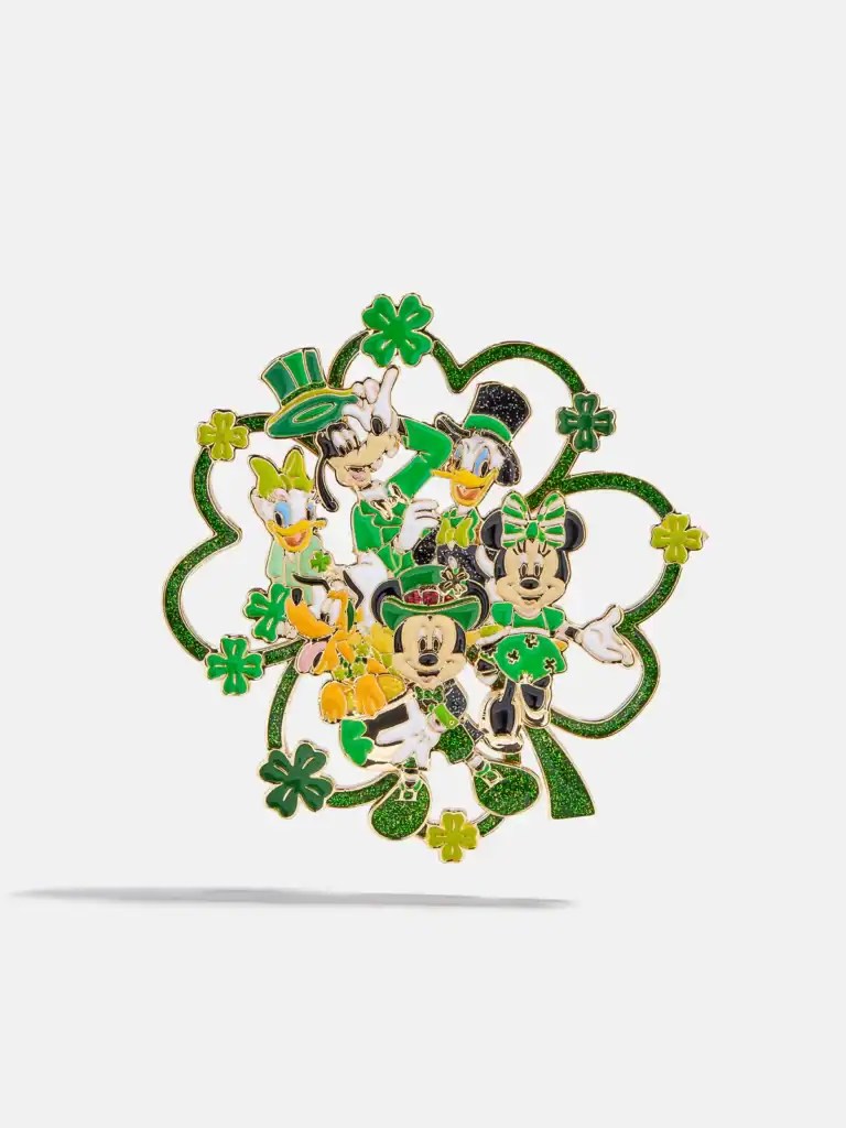 Disney characters celebrating St. Patrick's Day with green accessories and festive attire.