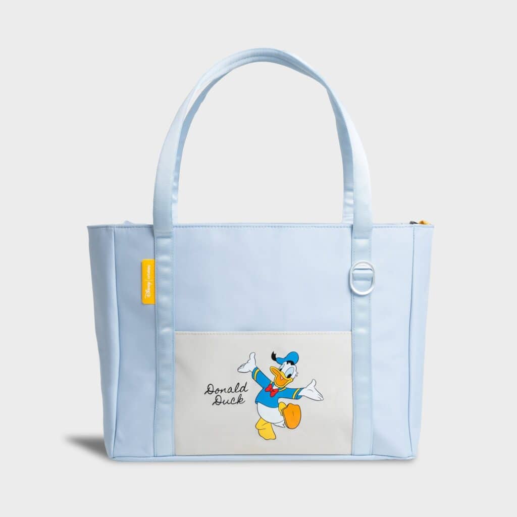 Light blue Donald Duck tote bag with embroidered Donald Duck design.