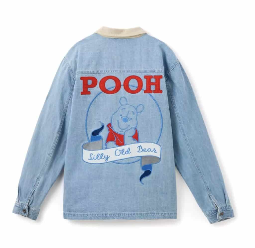 Blue denim jacket featuring Winnie the Pooh and "Silly Old Bear" embroidery.