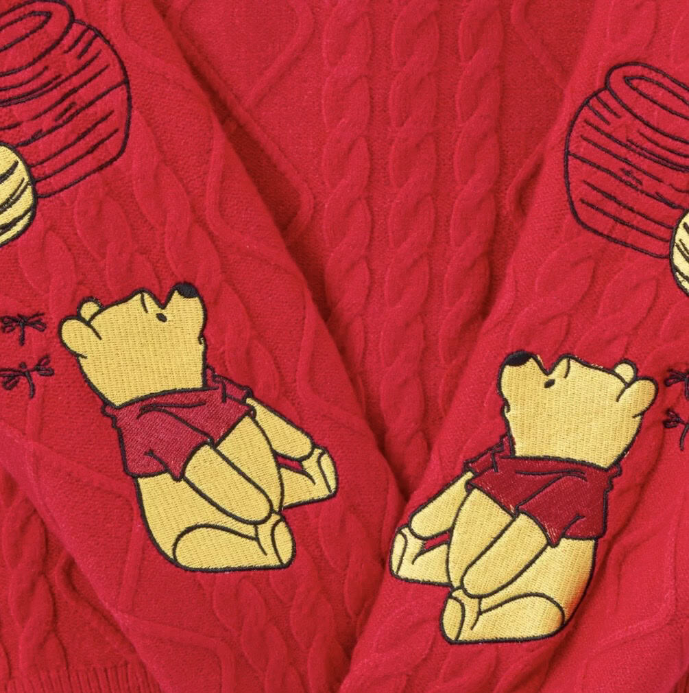 Cozy red Mickey Mouse knit sweater with cartoon character print.