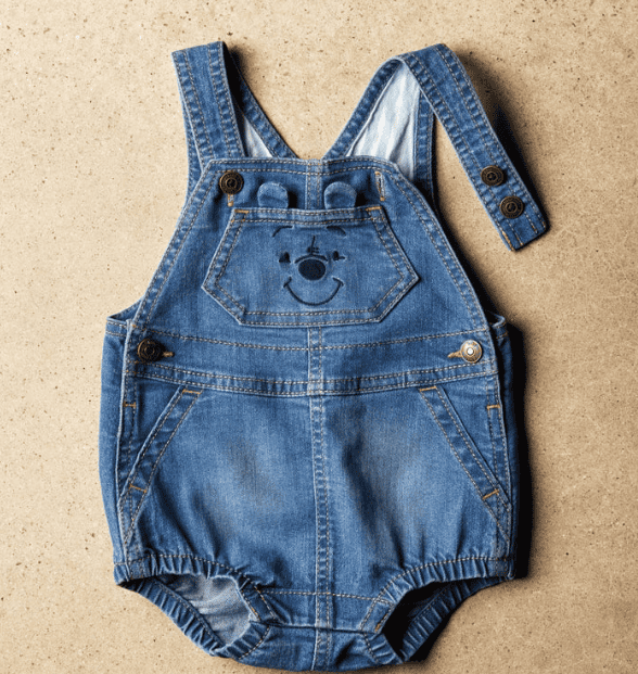 Baby denim overalls featuring Winnie the Pooh face embroidery, perfect for celebrating 100 years of.