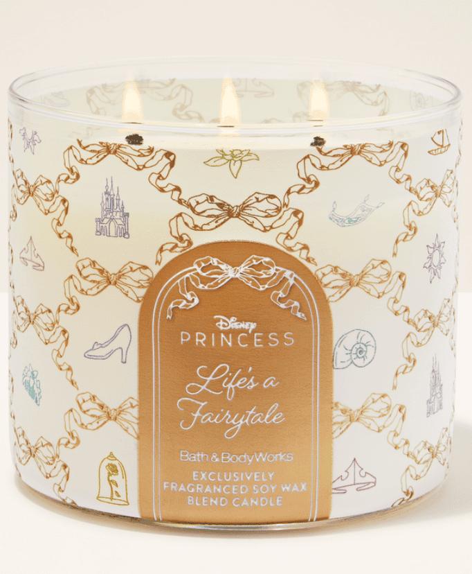 Disney Princess-themed candle with fairy tale icons and elegant packaging.