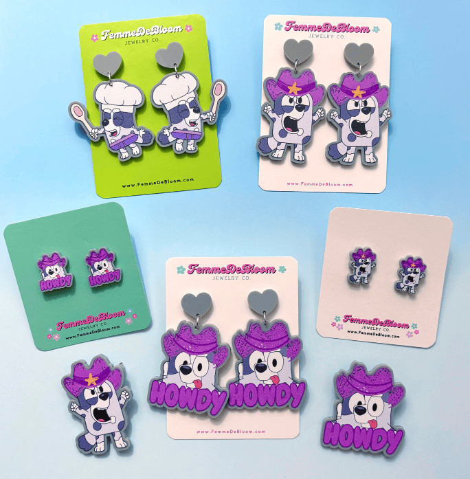Disney character earrings with purple hair and fun, whimsical styles.