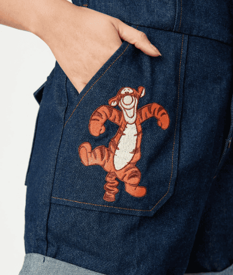 Embroidered denim pocket featuring Tigger from Winnie the Pooh, perfect for Disney fans.