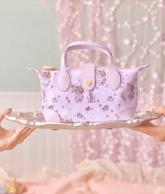 Mini Disney princess bag with pastel purple color and unicorn print.