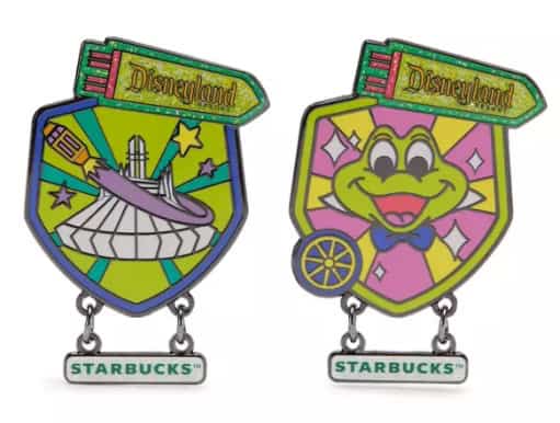 Disneyland and Starbucks themed enamel pins featuring iconic symbols and character art.