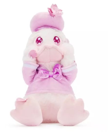 Pink plush toy with large eyes, bow, and soft features, inspired by Disney characters.