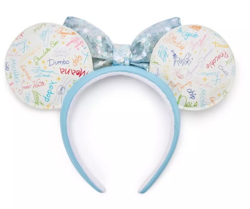 Autograph headband featuring Disney characters' signatures and a sparkly bow. Perfect for Disney fan.